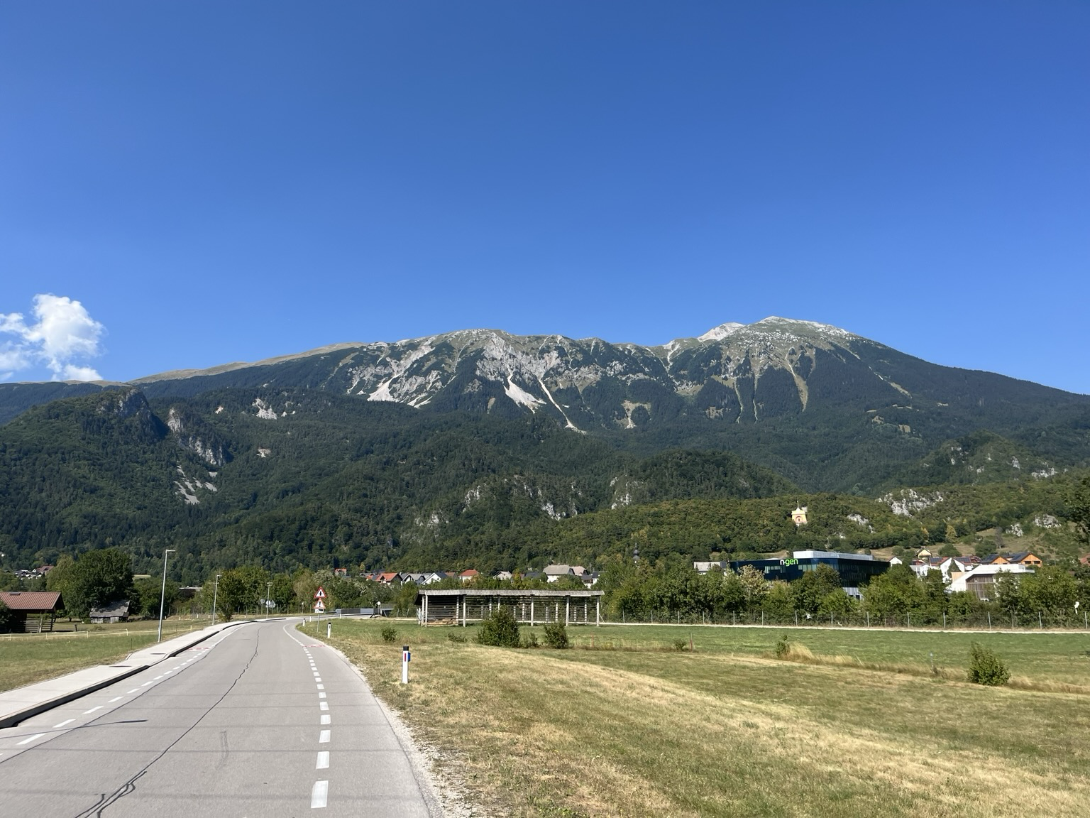 Road with the Karawanken mountains in the distance