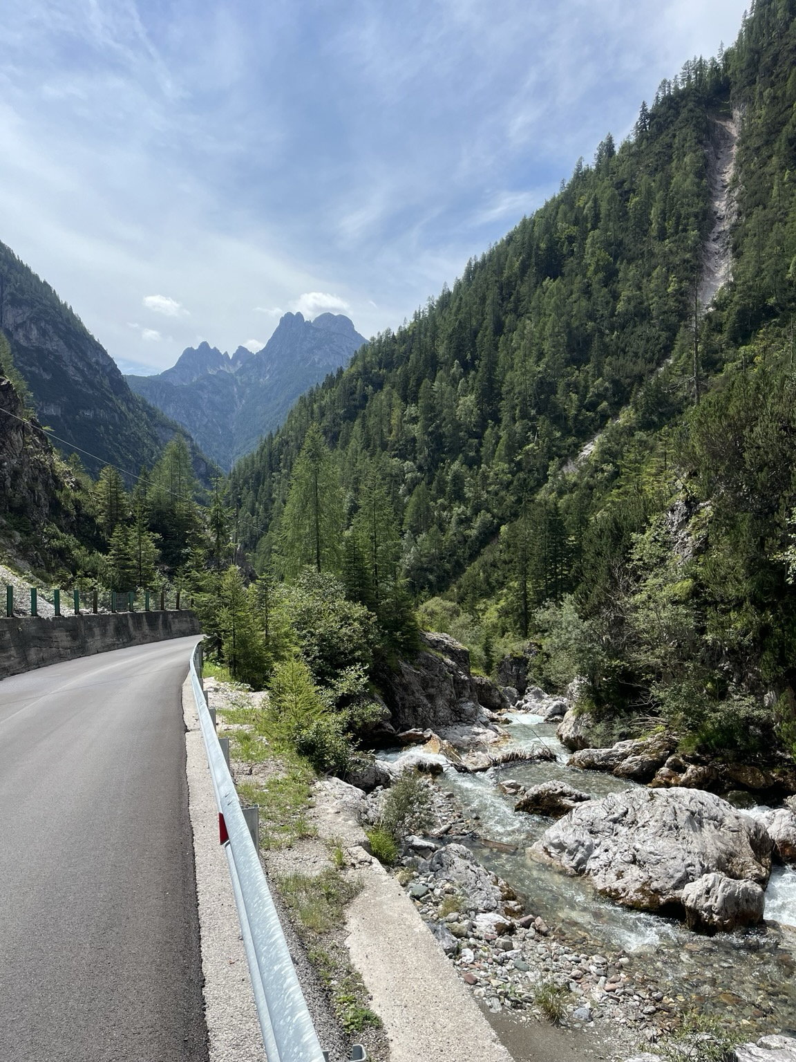 Asphalt descent in a deep valley
